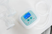 s5+ breast pump on white table with pump on to show settings
