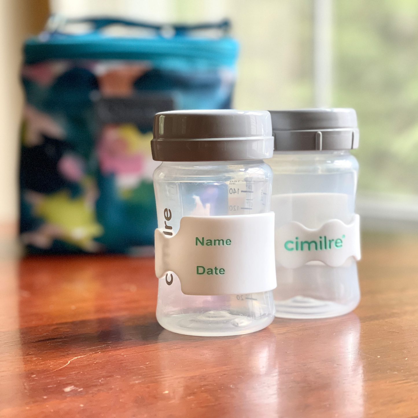 cimilre bottle band labels on table with cooler bag